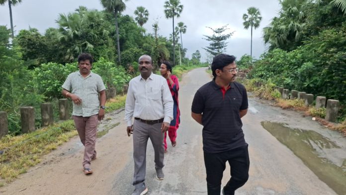 Officials inspect the low-level bridge