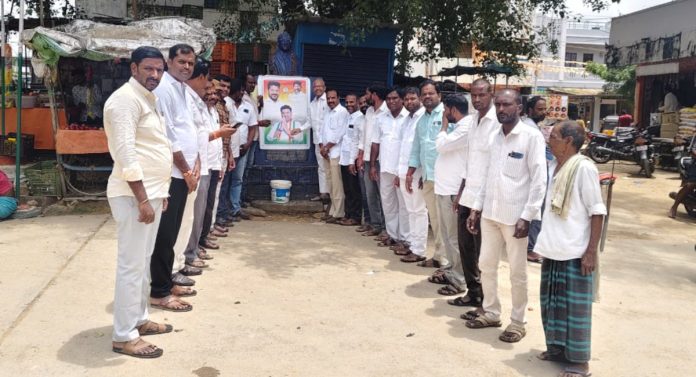Portraits of CM Deputy CM and MLAs anointed with oil