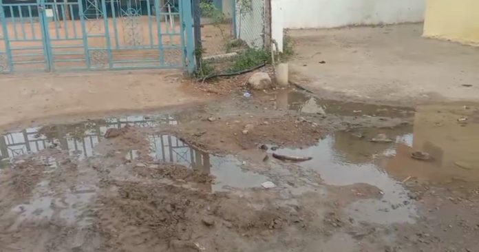 The premises of Jukkal ZP High School are covered in mud..
