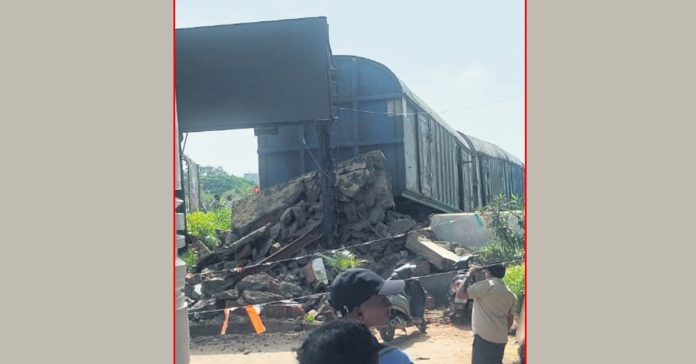 Goods train hits wall