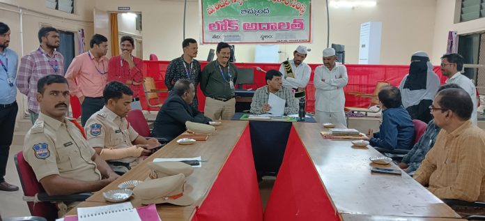 365 cases resolved in National Lok Adalat