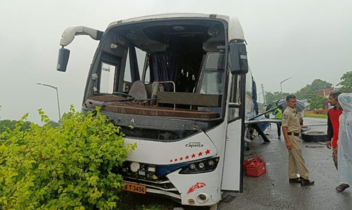 Bus hits container