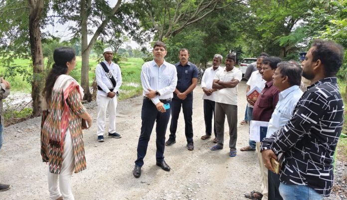 Collector inspects road renovation works