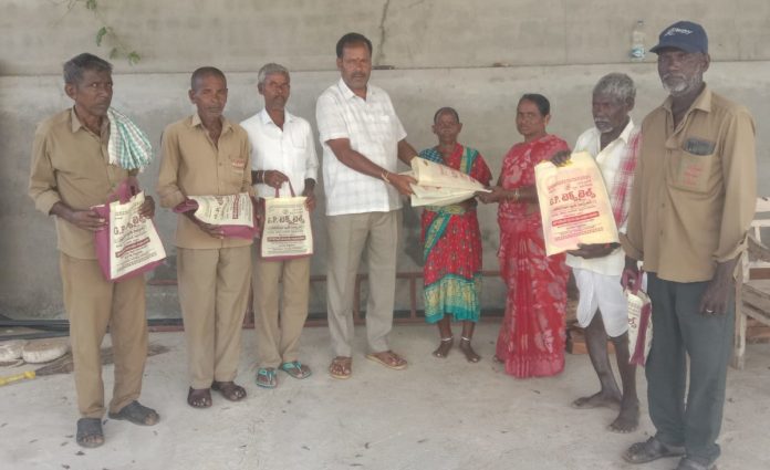 Distribution of new clothes to GP workers..