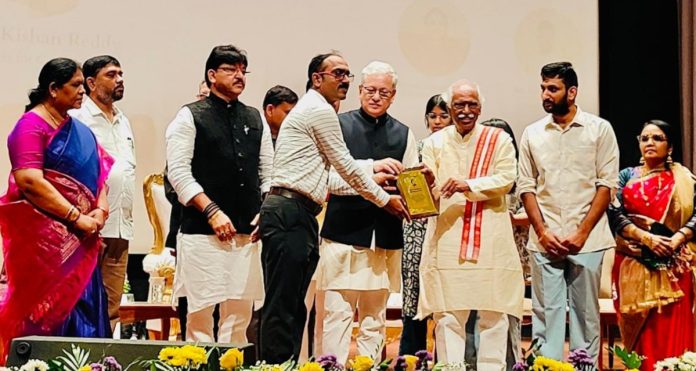 Officials receiving certificates of appreciation from the Governor