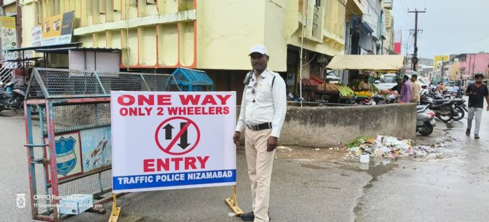 One-way traffic begins on Devi Road..