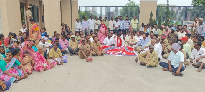 Protest in front of the Collectors office demanding payment of arrears of wages.