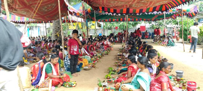Saffron worship in Durga Devi Mandal