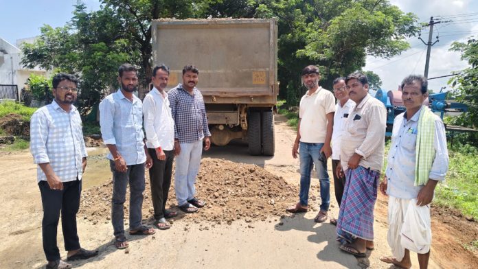 Temporary road repairs with own money