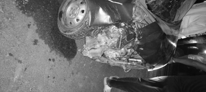 Two cars collide head-on..