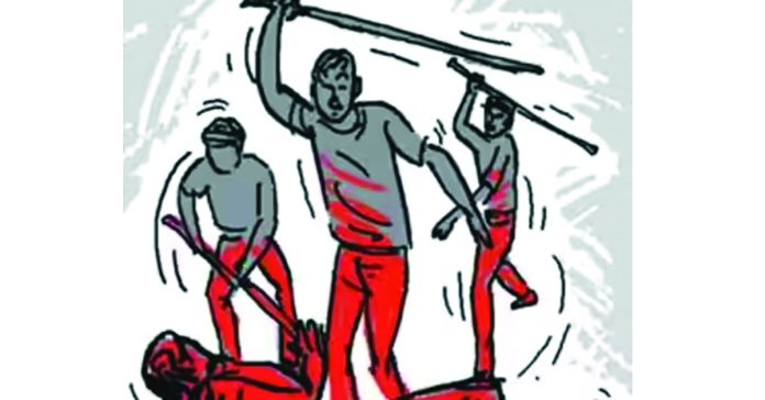 Two people were beaten to death by a mob over the death of a boy.