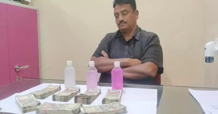 ACB catches Ellampet town planning officer taking bribe