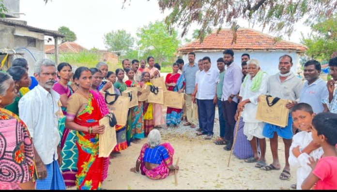 A saree was given to a family to attend their sons wedding. A saree was given to a family to attend their son's wedding.