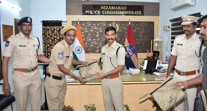 CP presents raincoats to Home Guards Division