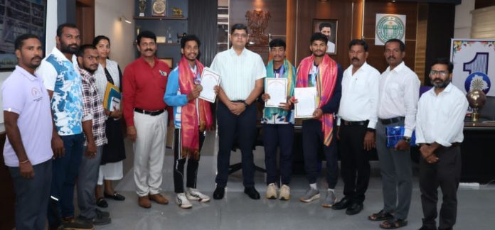 Collector felicitates athletics gold medal winners Collector felicitates athletics gold medal winners