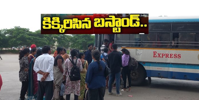 Crowded bus stand... People are running for buses