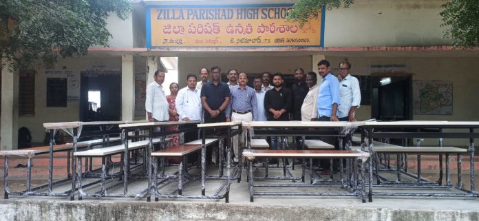 Distribution of desks and benches to Macherla School