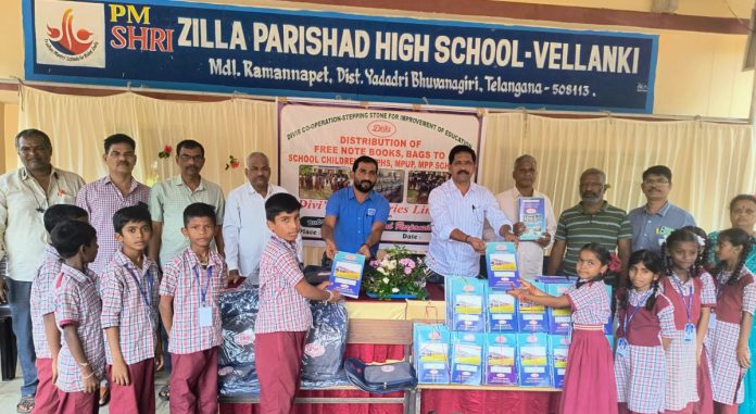Divis presents books and bags to Vellanki students