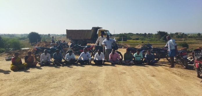 Farmers protest against construction of railway line, demand compensation for crop damage Farmers protest against construction of railway line, demand compensation for crop damage