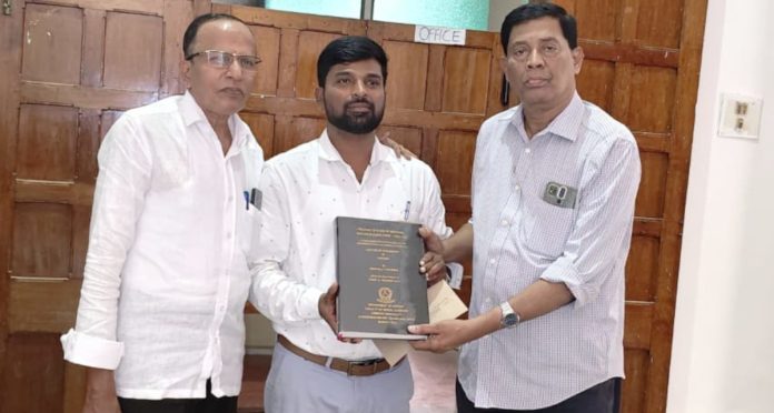 Farmers son receives doctorate