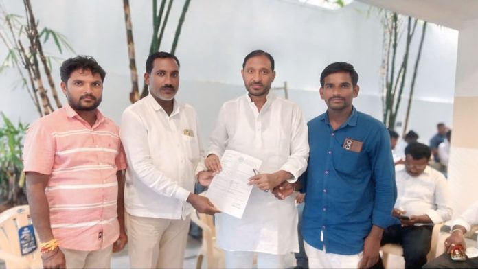 MLC Koti Reddy presents LOC cheque