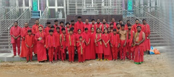 Wearing the Pochamma initiation garland.. Wearing the Pochamma initiation garland..
