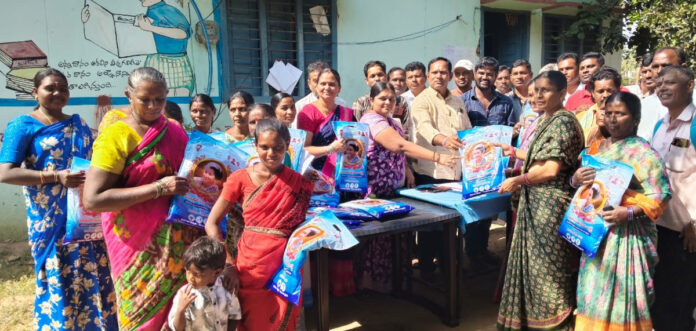 Distribution of sarees in Rudraram..