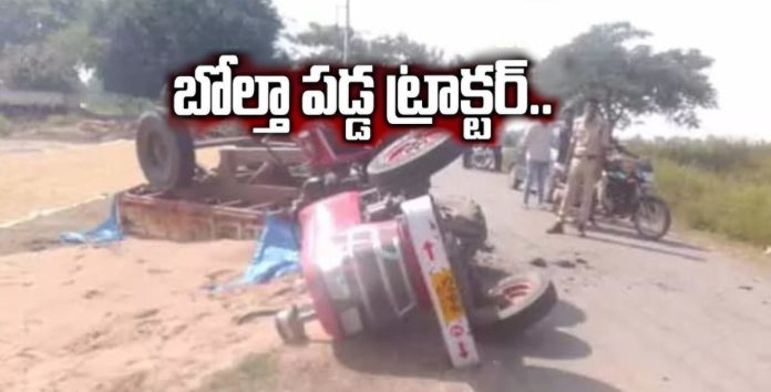 Sand tractor overturned