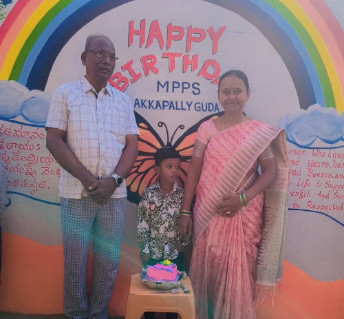 మనవడి జన్మదినం సందర్భంగా పాఠశాలకు బ్యాండ్ వితరణ