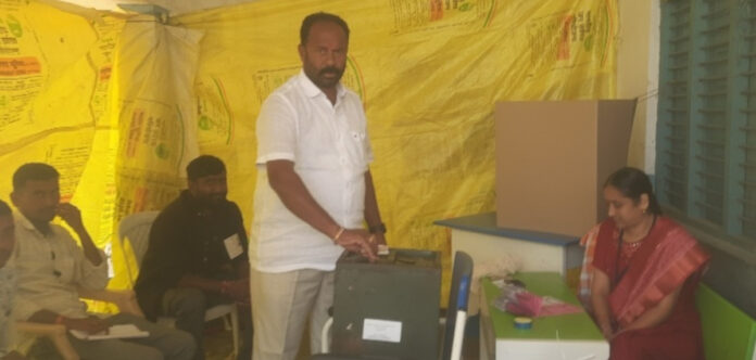 PACS Chairman Ippa Mondayya exercises his right to vote