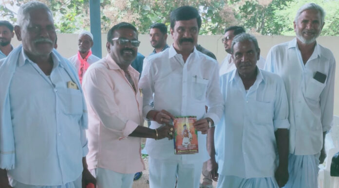 Temple committee members present invitation letter to MLA