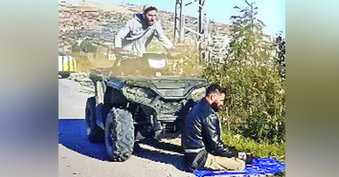 While they were offering prayers, an Israeli soldier's brutality.