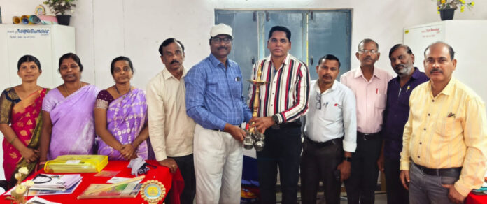 Distribution of brass plaque to Perikit School