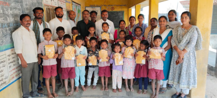 Distribution of clothes to primary school students