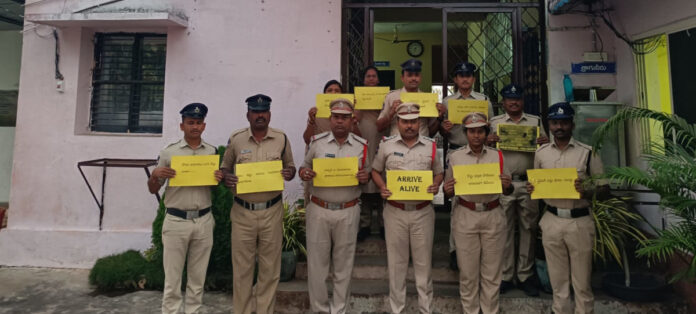 Police campaign with placards on traffic rules