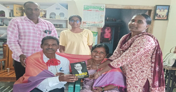 Sarpanch presented with Ambedkar biography book