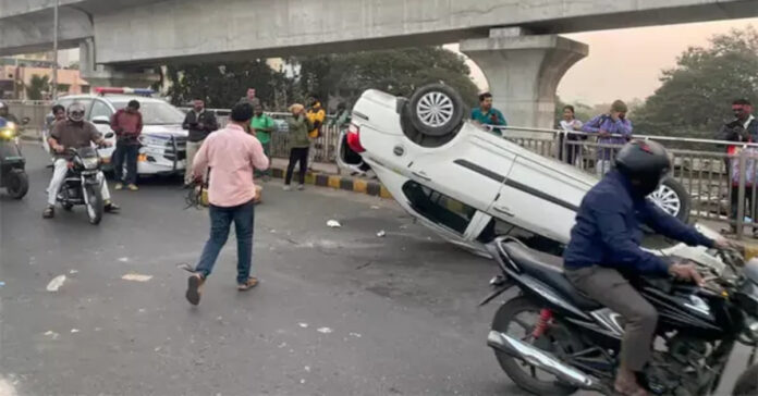Car overturns on Begumpet flyover, four injured