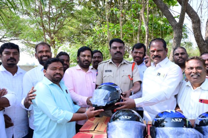 Wear a helmet, save your life, says S.I. Guru Swami.