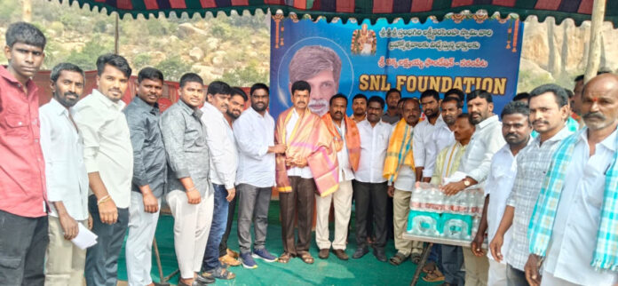 Free water bottles distributed at Sarampeta fair