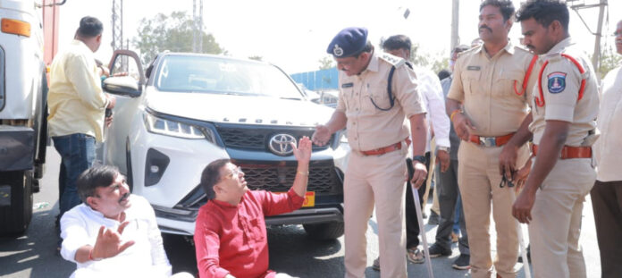 MLA protested by sitting on the road