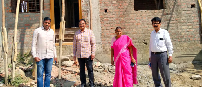Officials inspect the construction of Indirammas houses