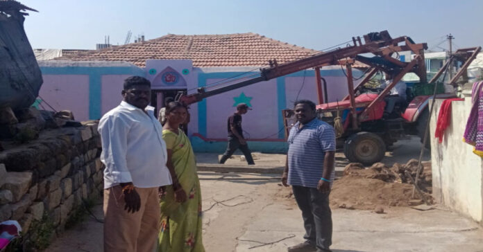 Removal of an electric pole in the middle of the road