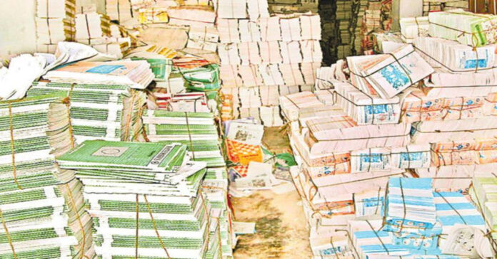 పాఠ్యాపుస్తకాలు అమ్ముకున్న సిబ్బంది.. ఇద్దరు సస్పెండ్