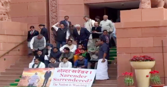 Opposition parties protest in front of Parliament