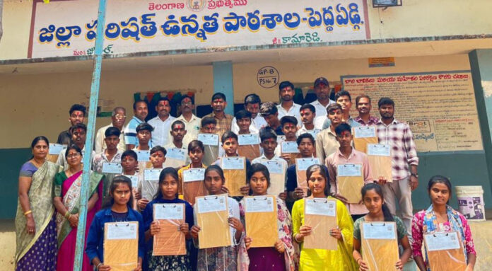 Examination pads and pens distributed to students in Peddaedgi