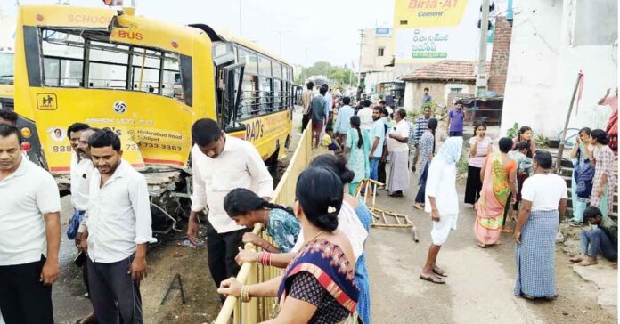 Lorry hits stationary school bus.
