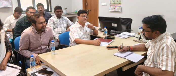Review meeting with municipal commissioners..