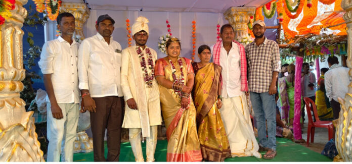 Sarpanch Srinivas blesses the newlyweds