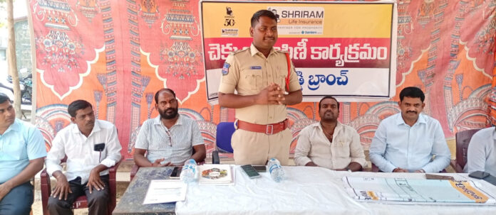 Shriram Life Insurance presents insurance cheques to former Sarpanch's family