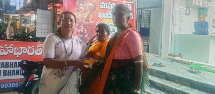 Donating food to the poor on the occasion of Akshaya Tritiya